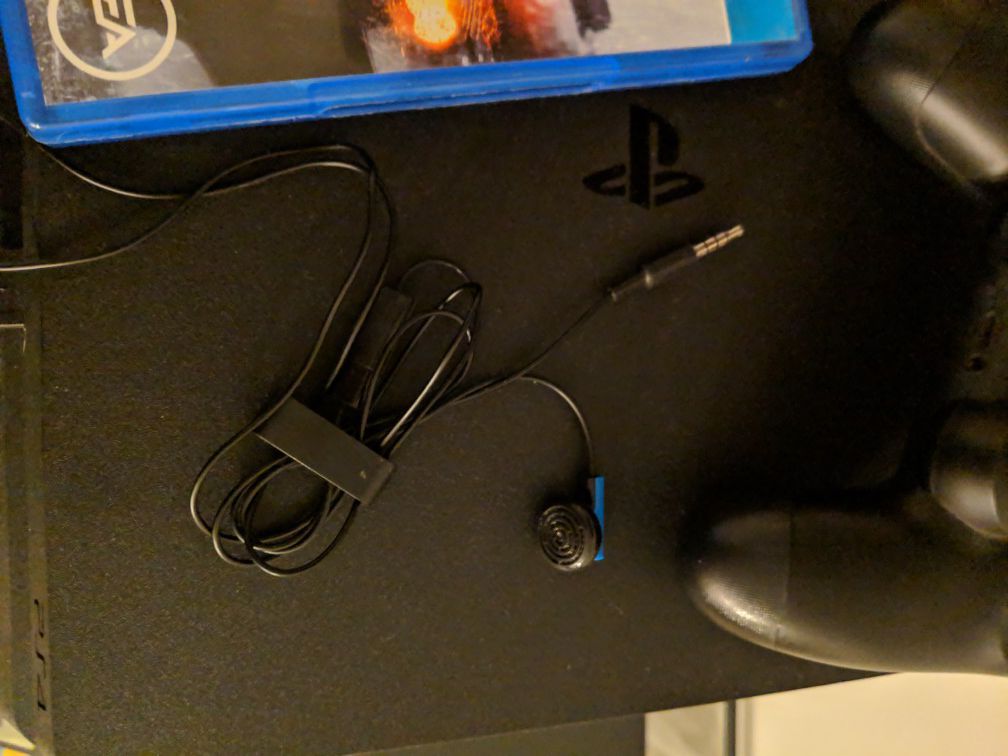 PS4 with games 1 control and headphones