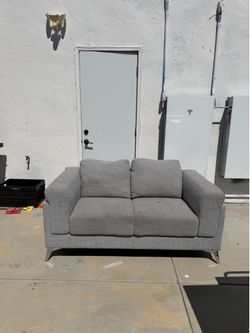 Small blue couch or loveseat