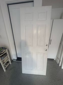 Garage entry interior door (fire-rated)