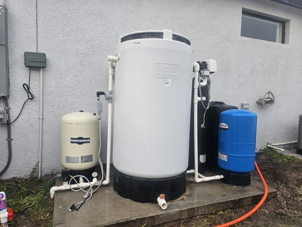 Water Filtration System and Pump for a Well