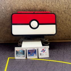 “New” 2ds xl poke ball edition console with games and charger