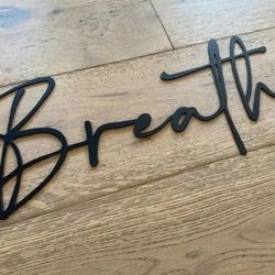 A Vintage 'Breathe' Metal Wall Art Piece Home Decor