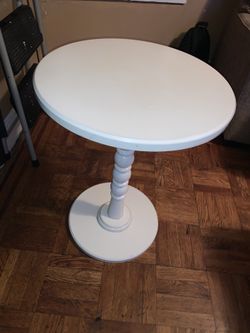 White wooden end table