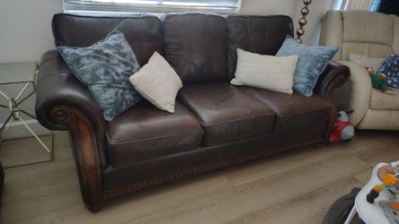 Two brown sofas from JCP Chris madden