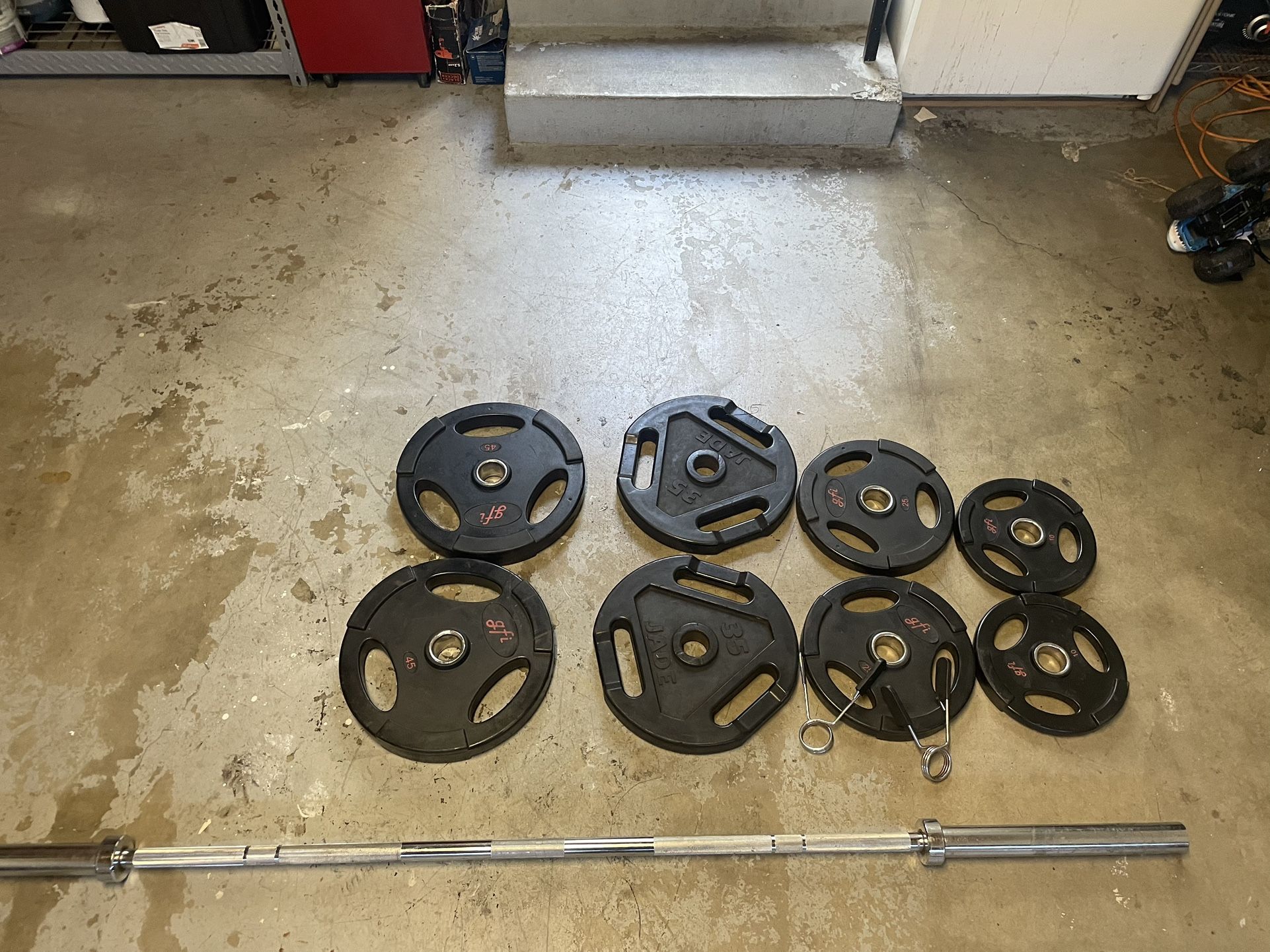 Olympic Weight Set- Bar/clips, 45s,35s,25s,10s.