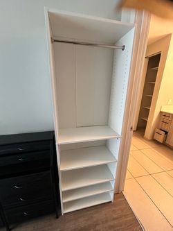 2 White bedroom storage shelves