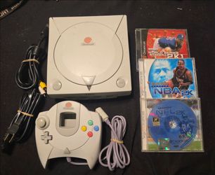 Sega Dreamcast video game console with games