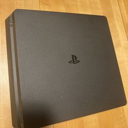 PlayStation 4 Slim 1TB – 2 Controllers, All Cables, Disk Drive