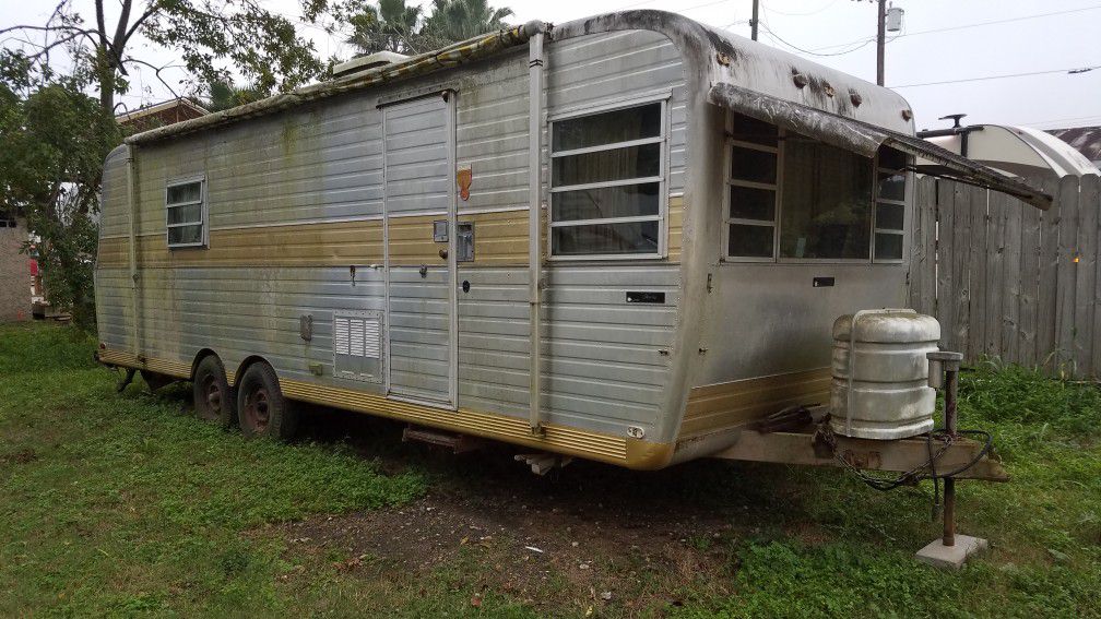 70s Boles travel trailer with title
