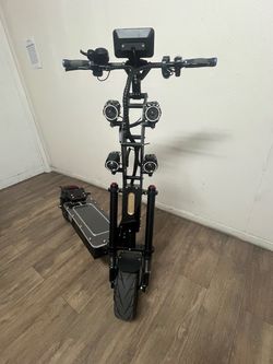 A FANTASTIC OPPORTUNITY TO ACQUIRE A SUPER- SIZED ELECTRIC SCOOTER FOR ADULTS