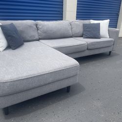 FREE DELIVERY!!! Gray 2 piece “Living Spaces” sectional couch with chase