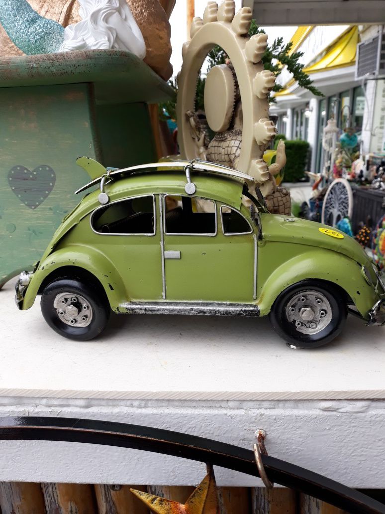 Cool tabletop VW Bug with surfboards on top
