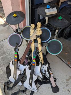Rockband 2 drum w/ cymbals Xbox and 6 guitars and mic