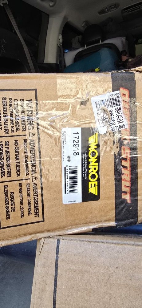 Monroe Quick-Strut 172918 Suspension Strut and Coil Spring Assembly for Kia Sedona