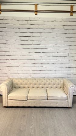 Tan Cream Tufted Roll Arm Couch