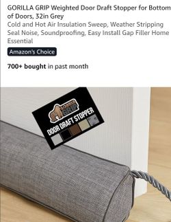 Pillow for door drafts , heavy cloth material with 2 loops at each end