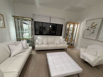 Beautiful Glass and Gold Display Cabinets