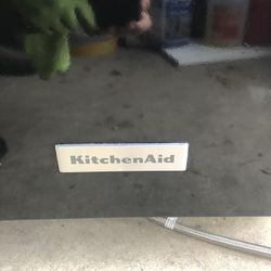 New Kitchen Aid Dishwasher GE gas Stove and Microwave 