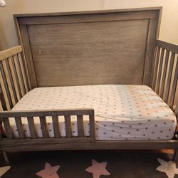 Delta Children's 4-in-1 Convertible Baby Crib