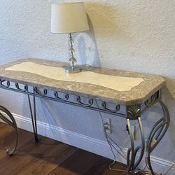 Beautiful entry or console are behind the sofa table