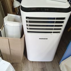 9,000 btu portable air conditioner with remote works great like new cash only
