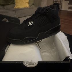 Grade School Black Cat 4’s Size 5