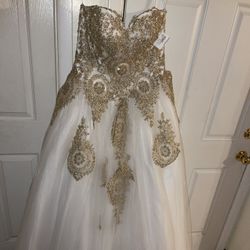 size: M gold and white ball gown with corset back 