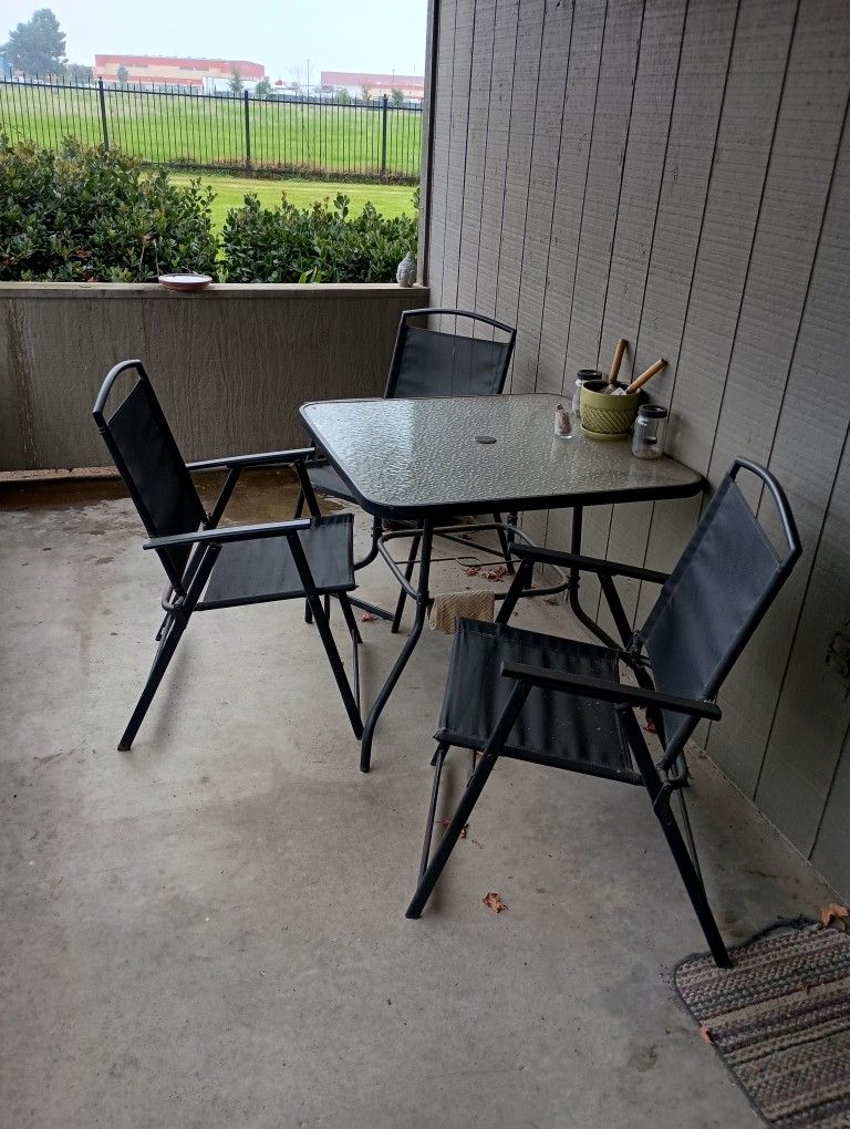 4-Person Black Patio Set – Table + 4 Chairs