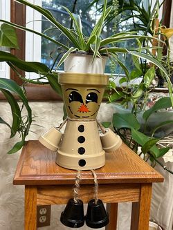 Scarecrow clay pot  35.00  OBO