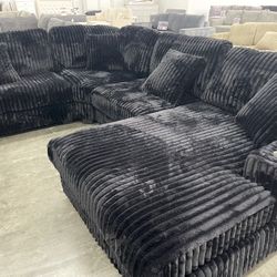 Black Sectional Sofa With Thick Fur Like Corduroy