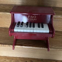 F A O Schwartz tiny piano