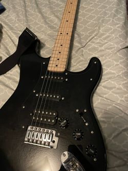Barely used guitar( Comes With An Amp, Guitar Bag And Random Accessories)