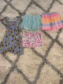 Girls skirts 1dress sizes 7-10 good condition