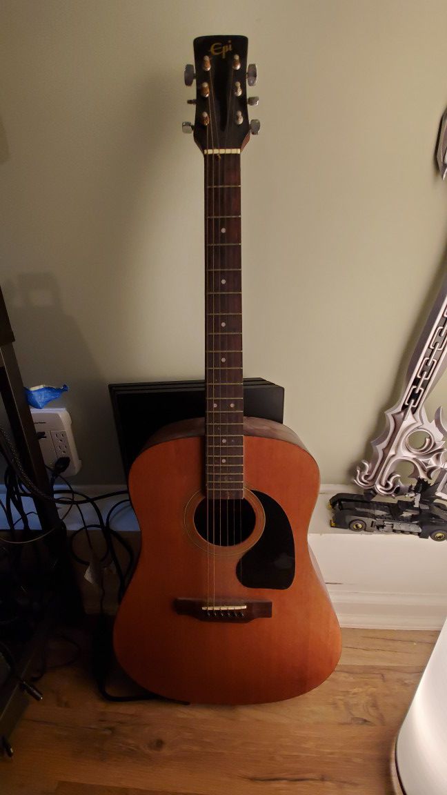 Epi acoustic guitar (model ED-100)