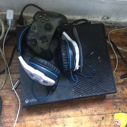 Xbox One With headphones And two Games Installed In The Game 