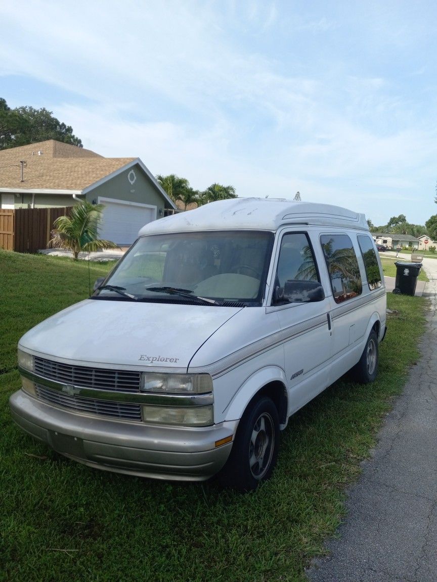 2002 Explorer Conversion Van, raised roof. Various cubby compartments. Runs and Starts 4.3 v6 engine. Chevy chassis, can be used as camper. Chevy Astro Van Chevy Astro