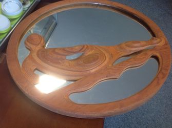 Mirror with a person in the middle