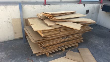 Free particle board shelves, an slat wall an pressboards