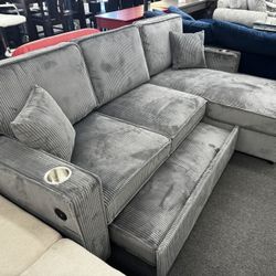 New Dark Gray Reversible Sectional W/ Cup Holder