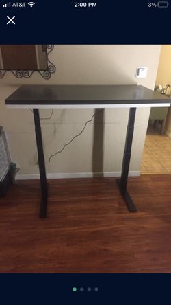 Electric height adjustable table