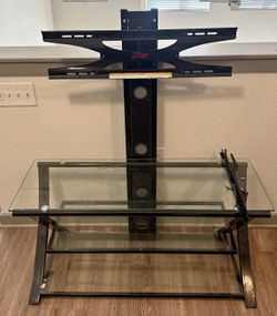 TV stand great conditions fits up to a 65 in tv