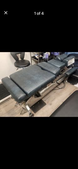Lioyd Galaxy Chiropractic Hi-Low table with 4 Manual Drops