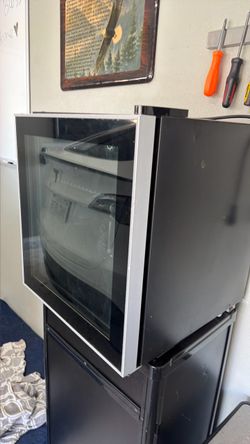Mini fridge with clear glass and led light.