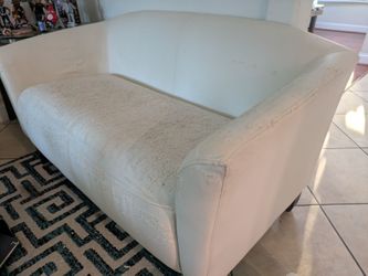 white loveseat and couch