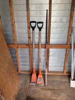 Two heavy duty construction scrapers and breaker bar. (Sold as a group)