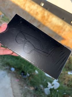 Sunglasses in Sealed Black Box