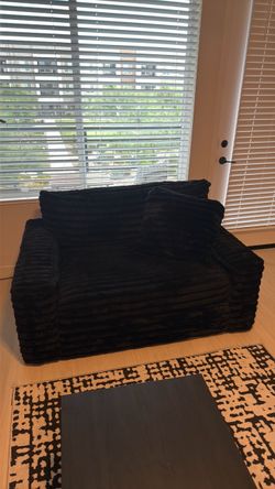 Fluffy black couch