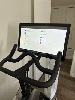 Peloton exercise Bike, Weights, and Mat