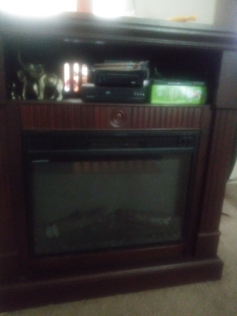 Cabinet with heater and artificial flames.