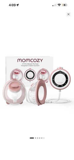 Momcozy pump. Closed box. Brand new. Never opened box.